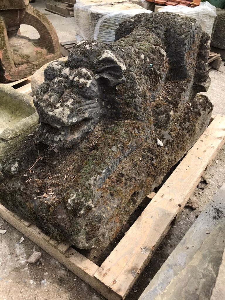 A highly detailed and decorative stone animal. APG Reclamation salvage yard have the perfect garden antiques.